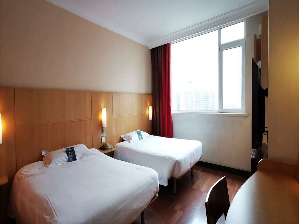 Ibis Tianjin Railway Station Hotell Rom bilde